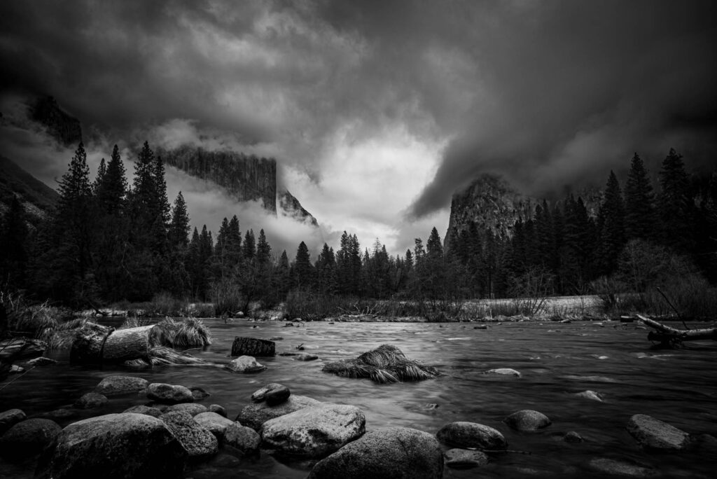 Merced River with Yosemite Valley and El Capitan towering in the background.